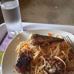 A picture of Spaghetti and Grilled fish.
