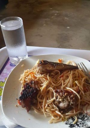 A picture of Spaghetti and Grilled fish.