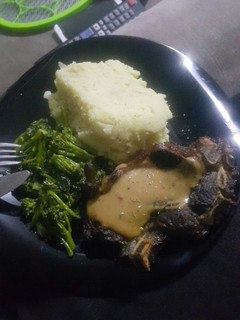 A picture of Creamy mash and steak.