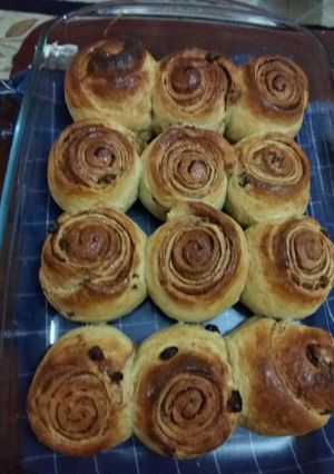 A picture of Cinnamon rolls with raisins.