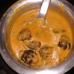 A picture of Brinjal tamarind gravy.