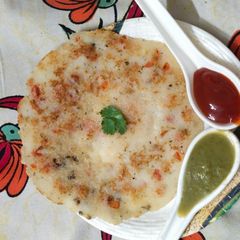 Carrot and onion suji cheela A picture of Carrot and onion suji cheela.