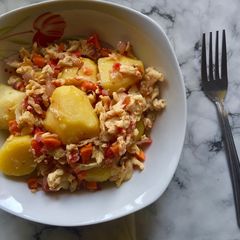 A picture of Scrambled eggs with vegetables & potatoes.