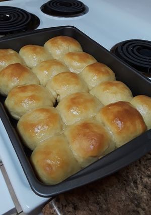 A picture of Honey Butter Dinner Rolls.