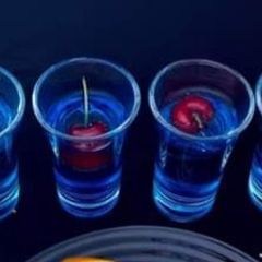 Butterfly pea tea shots A picture of Butterfly pea tea shots.