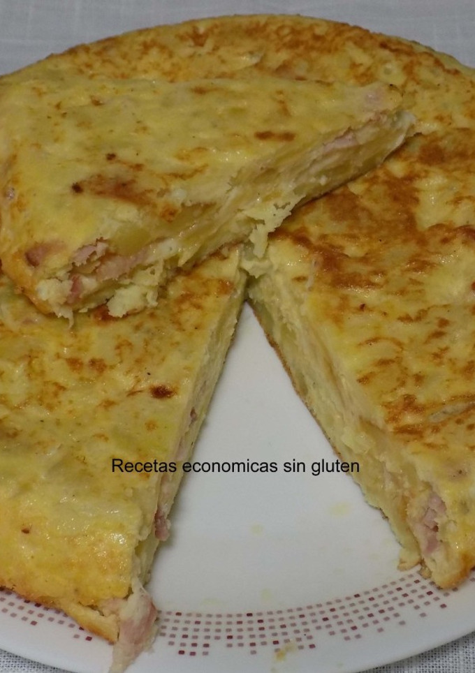 Una foto de Tortilla de patatas rellena de bacon y queso