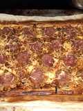 Tarte fine de saucisse de Morteau et oignons confits