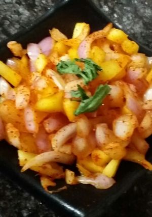 A picture of Raw mango onion salad.