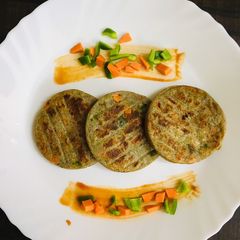 A picture of Millet flour vegetable uttapam.