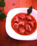 Lomo de cerdo en salsa de tomate natural con uvas pasas