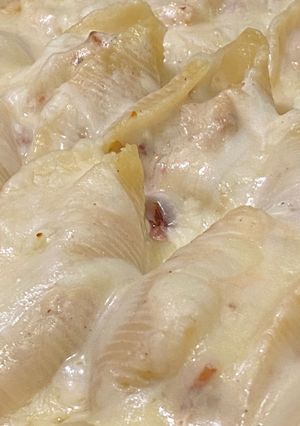 A picture of Chicken Bacon Ranch Stuffed Shells with Parmesan Garlic Sauce.