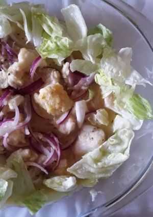 Una foto de Ceviche de merluza de mi casa 🐟