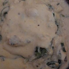 A picture of Chicken alfredo over zucchini noodles.