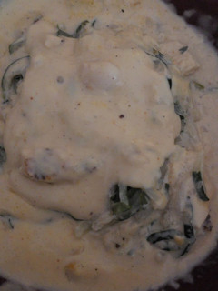 A picture of Chicken alfredo over zucchini noodles.