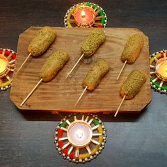A picture of Besan pistachios rolls.