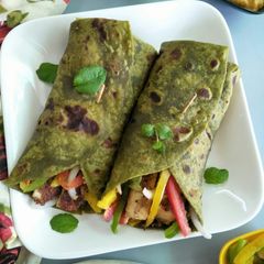 A picture of Creamy tofu in mint wraps.
