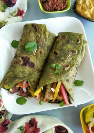 A picture of Creamy tofu in mint wraps.