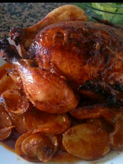 Una foto de Pollo al ajillo y zumo de pomelo