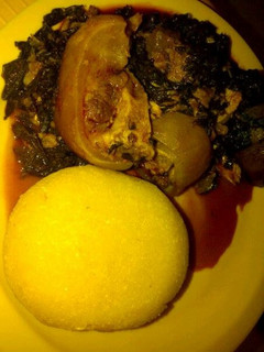 A picture of Vegetable soup and eba.