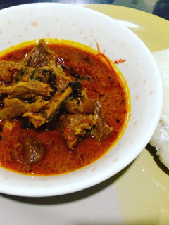 A picture of Banga soup with pounded yamg.