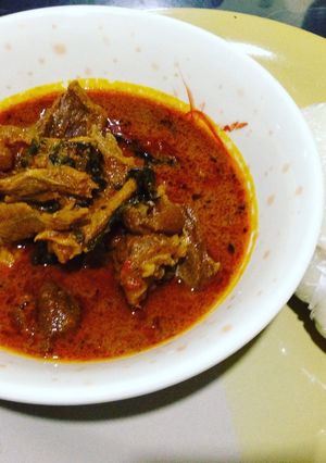 A picture of Banga soup with pounded yamg.