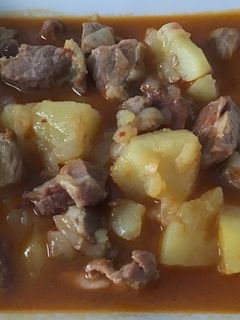 Una foto de Carne de cerdo con paprika en salsa