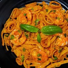 A picture of Creamy Tomato Seafood Tagliatelle.