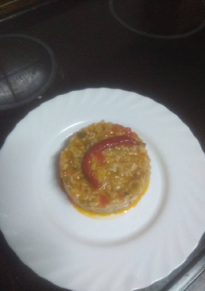 Una foto de Arroz con habas y pavo frito