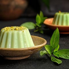 A picture of Pistachio and Basil Panna Cotta.