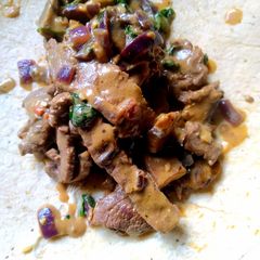A picture of Minute steak wrapped.