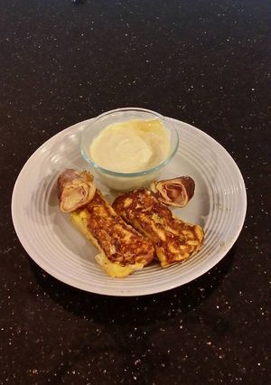 A picture of Ham and Cheese Toasted Roll Ups.
