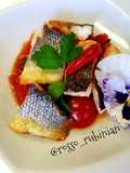 Filetto di spigola, pomodorini e olive taggiasche