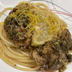 A picture of Chicken Piccata over Lemon Basil Pasta.