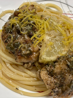 A picture of Chicken Piccata over Lemon Basil Pasta.