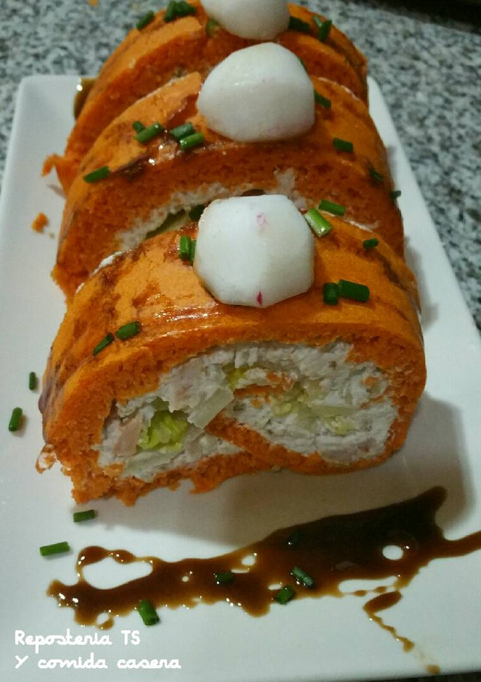 Una foto de Brazo salado relleno de queso philadelphia con gambas