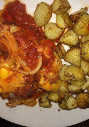 A picture of Cheesy pork rolls with roasted potato cubes.