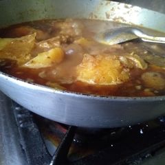 A picture of Mutton potato curry.