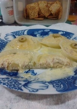 Una foto de Cappellini de ricotta y jamón cocido, gratinados
