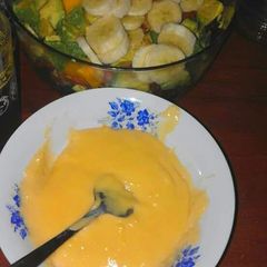 A picture of Fruit Salad n Custard topping.