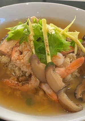 A picture of Oat Shiitake Mushroom Soup with Prawns.