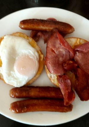 A picture of My Sausage, Bacon & Poached Egg on Bagels Lunch 🥰.