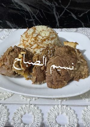 صورة لوصفة لحم مندي مع الرز بالشعريه