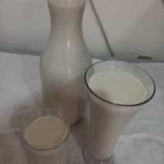 A picture of Rice potatoes and coconut juice.