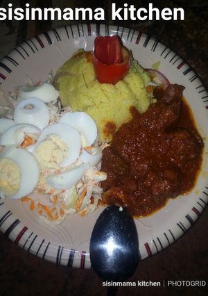 A picture of Fried cous-cous with stew.
