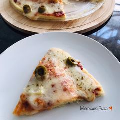 Microwave Pizza 🍕 A picture of Microwave Pizza 🍕.