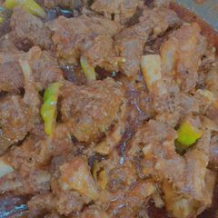 A picture of Achar gosht (pickled mutton curry).