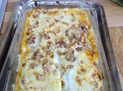 Una foto de pencas de acelga con queso