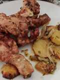 Muslos asados de pollo con patatas panaderas