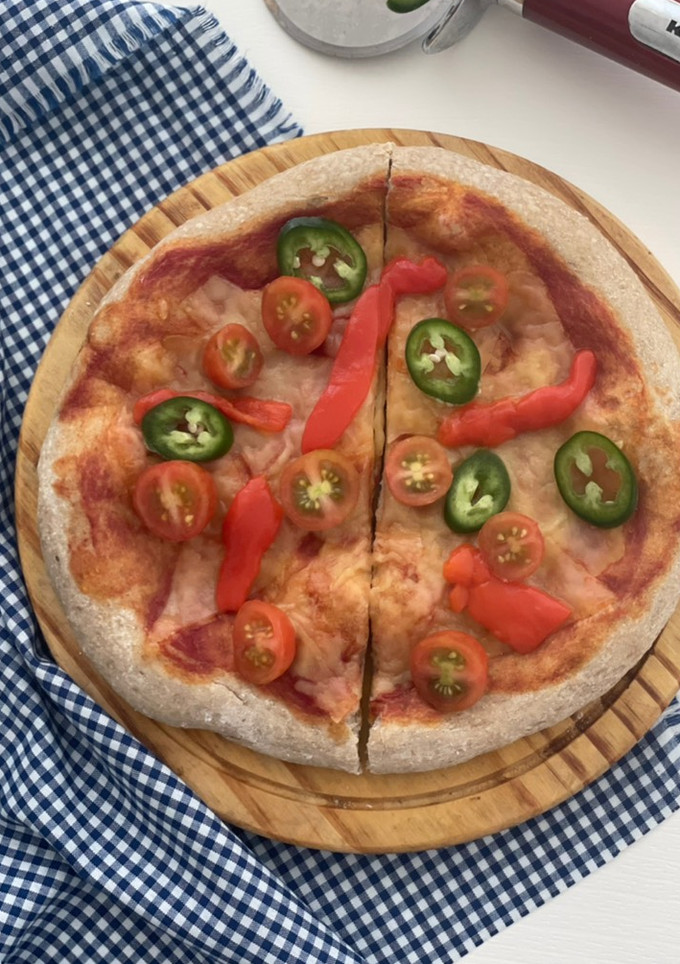 Una foto de Pizza vegana