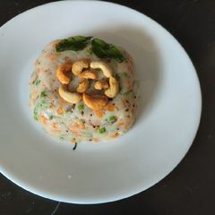 A picture of Upma with cashwnut /healthy breakfast.